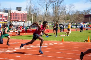 Track athlete running a race.